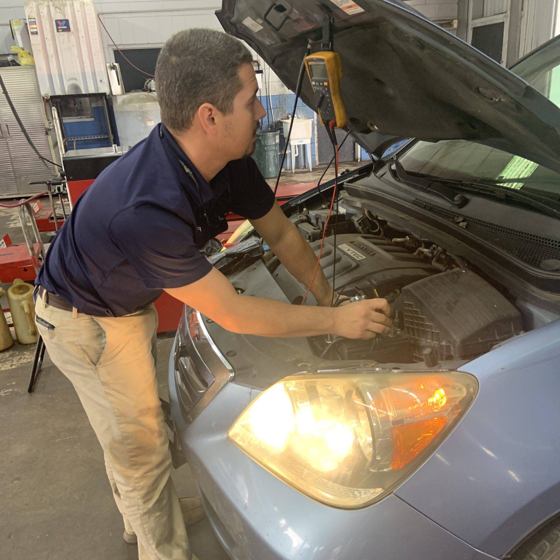 Certified Mechanic working on a car | D&R Car Care | Statesboro, Ga